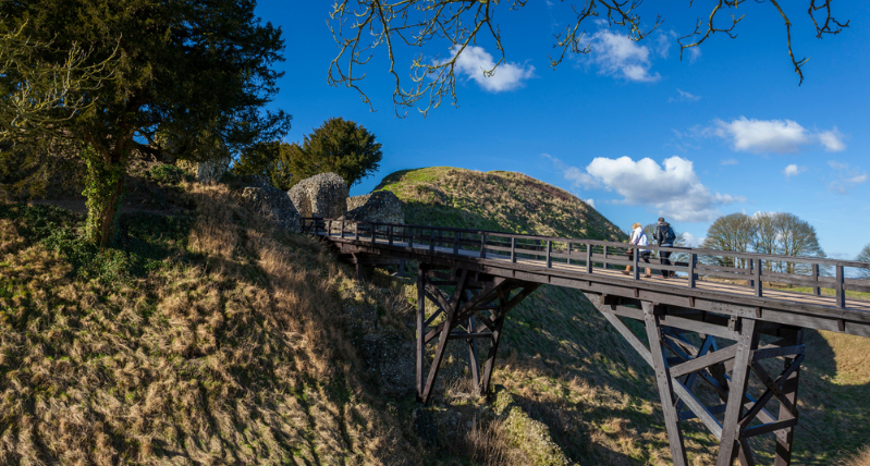 Walking across bridge to Old Sarum Ruins